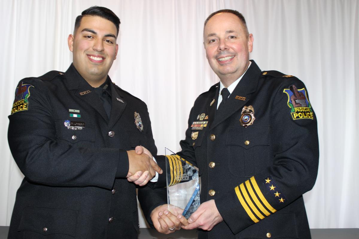 Officer Pedro Loredo and Chief Brian Laird